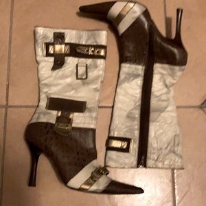 Size 11 leather boots. Made in Spain. Never worn